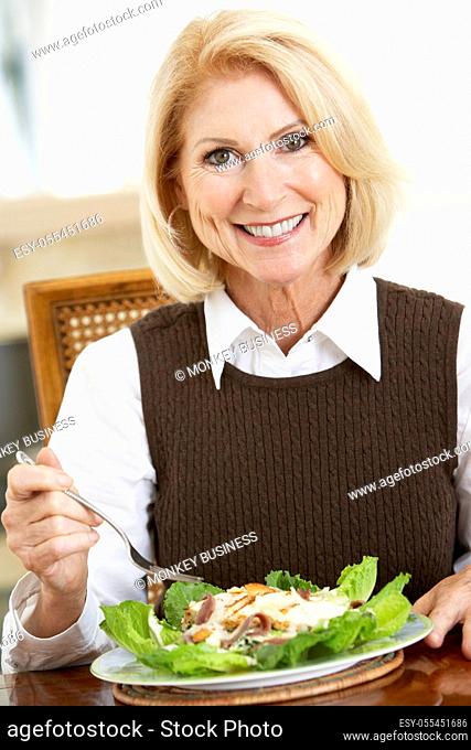 woman, eating, salad plate, caesar salad