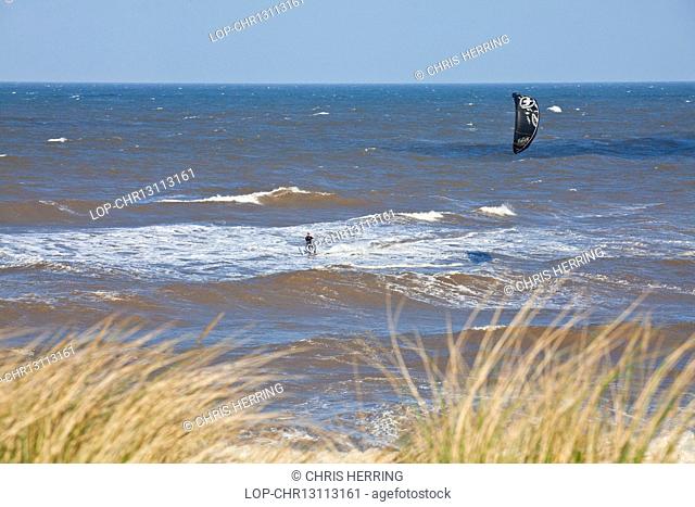England, Norfolk, Sea Palling. Kite surfing at Sea Palling on the Norfolk coast