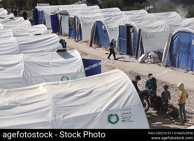 19 February 2023, Syria, Salqin: People are seen at an emergency shelter built for those affected by the earthquake that ravaged the Turkish-Syrian border