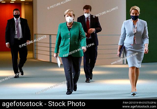19 October 2020, Berlin: Federal Chancellor Angela Merkel (M, CDU) and Federal Minister for Family Affairs Franziska Giffey (r