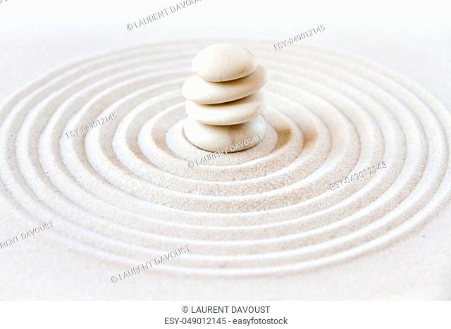 White stones pile in the sand. Zen japanese garden background scene