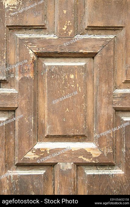 Closeup of an old wooden door in Spain