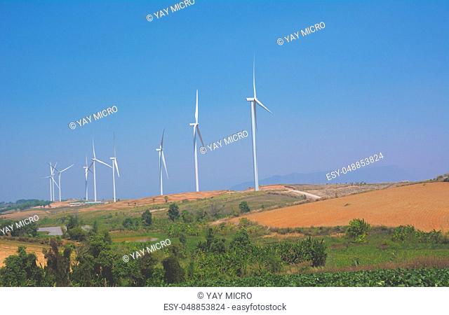 Wind turbines under the blue sky. Wind turbines generating electricity