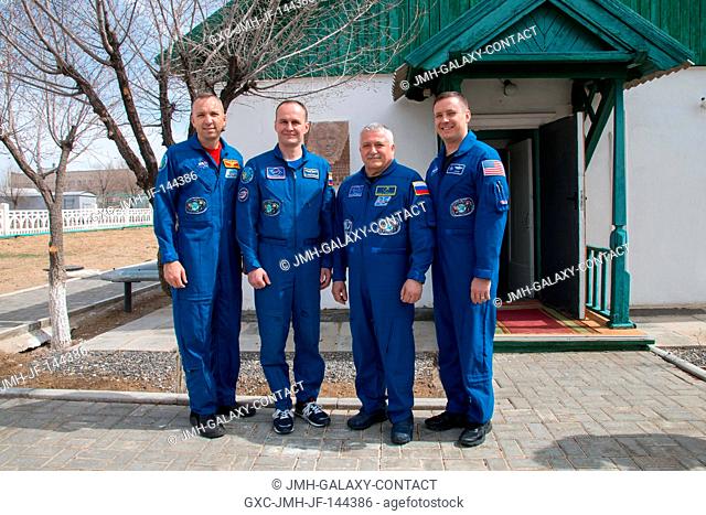 At the Baikonur Cosmodrome in Kazakhstan, the Expedition 51 prime and backup crewmembers pose for pictures April 14 in front of the cottage where Yuri Gagarin...