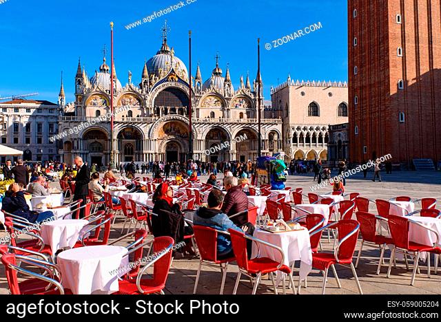 Outdoor dining seats at St Mark's Square (Piazza San Marco), Venice, Italy