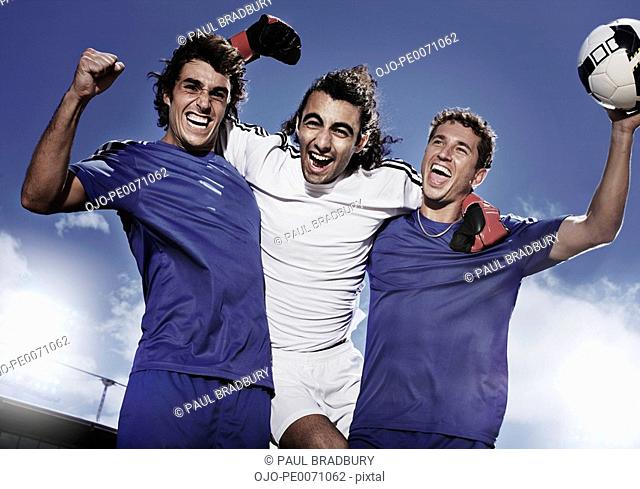 Soccer players cheering