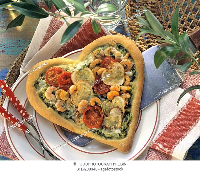 Pizza heart with shrimps, courgettes & cherry tomatoes