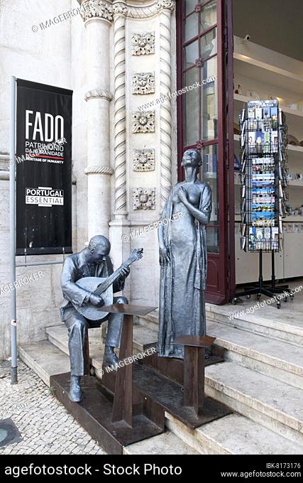 Sculptures in front of a shop, Fado musicians, Lisbon, Portugal, Europe