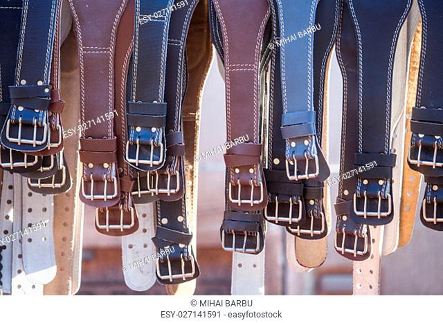 Color image of some leather belts on display
