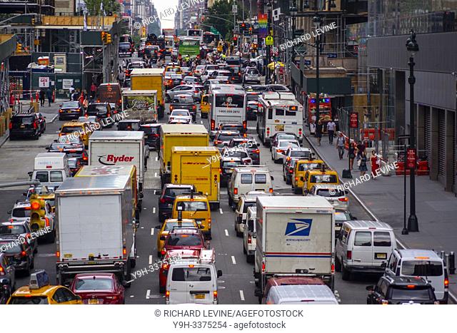 Vehicles clog Tenth Avenue in New York on Tuesday, July 2, 2019 as they attempt to enter the Lincoln Tunnel during the Great Fourth of July Getaway