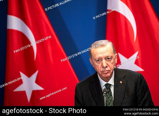 18 December 2023, Hungary, Budapest: Recep Tayyip Erdogan, President of Turkey, speaks at the Carmelite Monastery during a joint statement with Hungarian Prime...