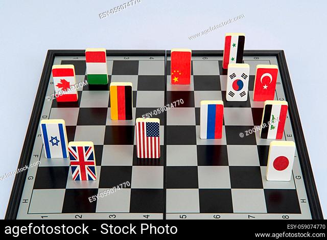 Symbols of the countries on the chess Board. Conceptual photo, political games