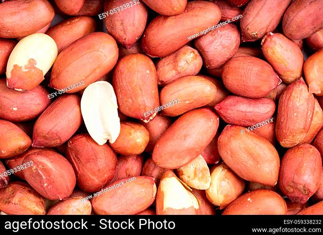 food background - many shelled peanut seeds