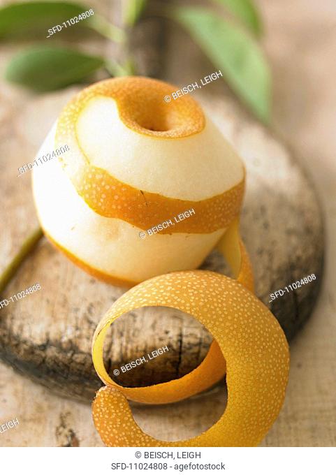 Partially Peeled Pear with Peel
