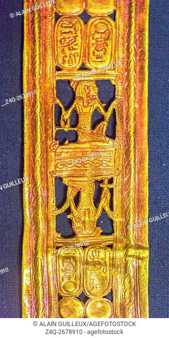 Egypt, Cairo, Egyptian Museum, Tutankhamon jewellery, from his tomb in Luxor, buckle in red Gold, showing a double scene : The god Heh brings the cartouches of...