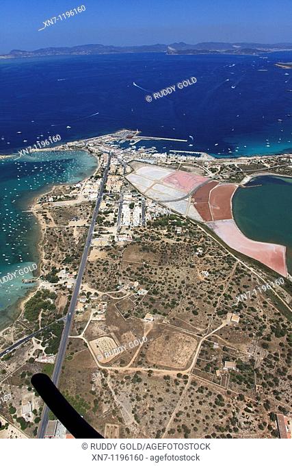 Es Savina harbor, Des Peix lagoon on the middle left and Pudent lagoon on the right, Ibiza in the distance, Formentera, Balearic Islands, Spain