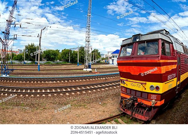 View of the railway track and passenger train in Russia