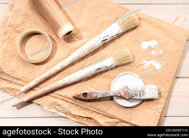 Set of painting tools brushes, masking tape, paper. DIY Home Improvement Paint. Top view