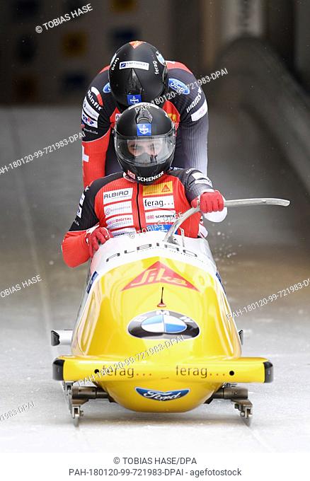 Switzerland's Clemens Bracher and Michael Kuonen launch into the race at the Bobsleigh World Cup men's doubles in Schoenau/Koenigssee, Germany, 20 January 2018