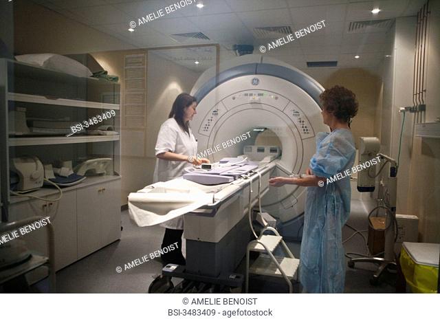 Photo essay at the department of medical imagery of the Diaconesses hospital in Paris, France. MRI after a doppler. The patient with an edema on the arm