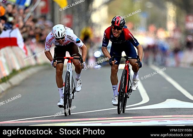 French Benoit Cosnefroy of AG2R Citroen and Polish Michal Kwiatkowski of Ineos Grenadiers sprint to the finish of the men elite 'Amstel Gold Race' one day...