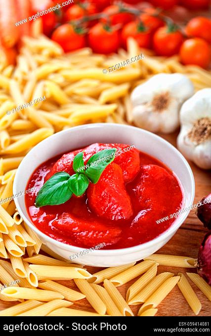 Peeled tomatoes to make pasta. High quality images