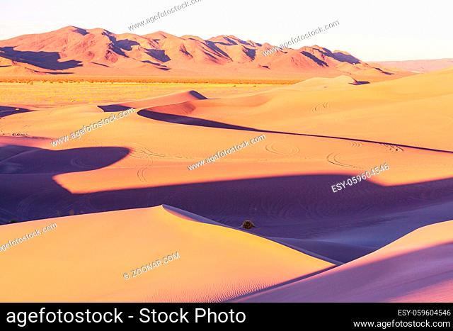 Sand dunes in Death Valley National Park, California, USA. Living coral toned