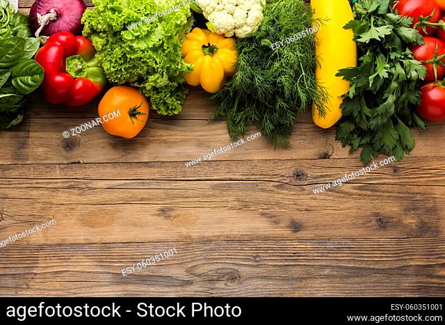 flat lay vegetables assortment wooden background