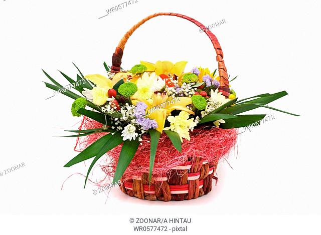 Beautiful bouquet in the basket on a white background