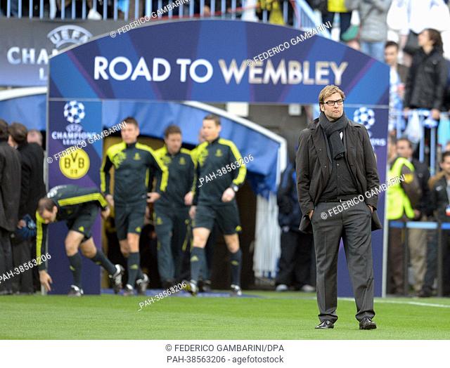 Dortmund's head coach Juergen Klopp (R) seen prior to the UEFA Champions League quarter final first leg soccer match between FC Malaga and Borussia Dortmund at...