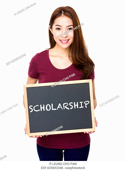 Young woman show with chalkboard a word scholarship