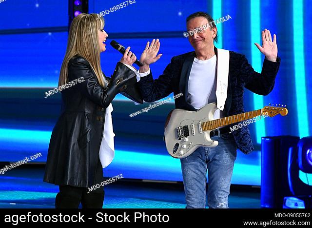 Italian tv host Milly Carlucci and the italian singer and guitarist Dodi Battaglia during the tv broadcast Il Cantante Mascherato at Rai Audit?orium of the Foro...