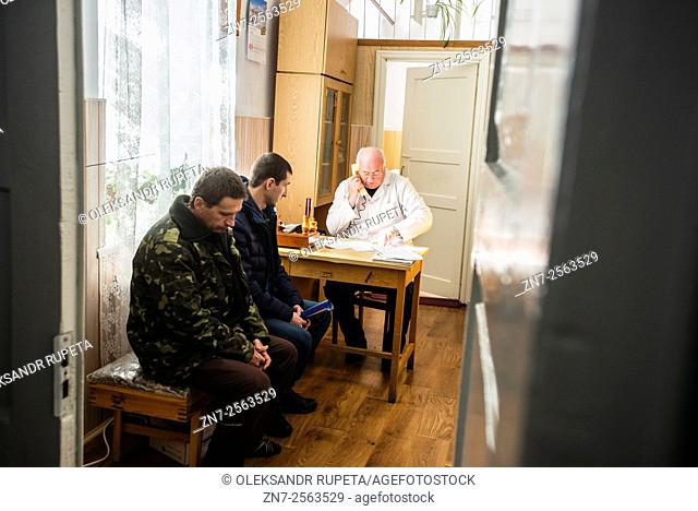 Soldiers sitting in the line in Physiotherapist ward in Military Hospital, Ukraine. During Ukrainian-Russian conflict military hospitals overloaded for more...