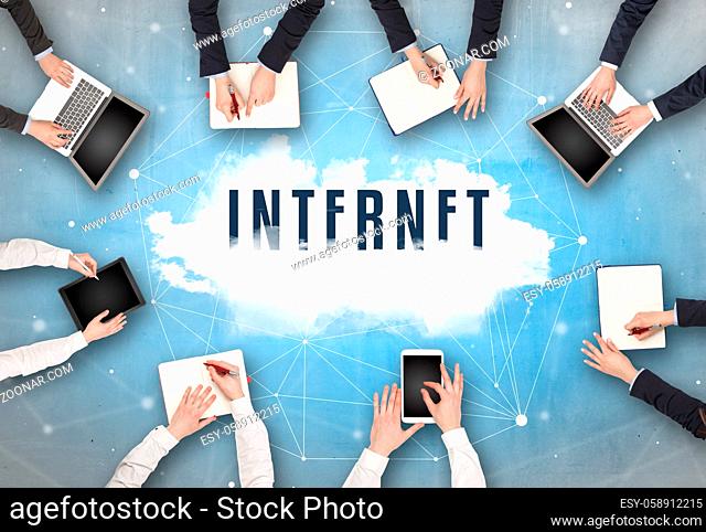 Group of people having a meeting with INTERNET insciption, web security concept