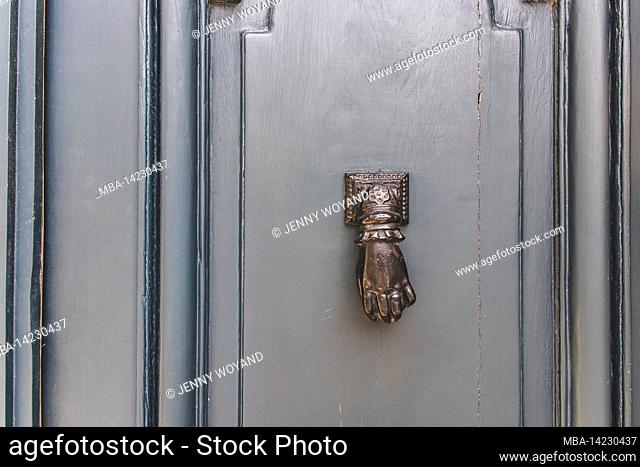 Antique doorknob on gray door, ÃŽle de Ré, France, Europe