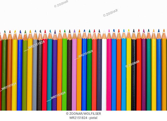 crayons in row isolated over white