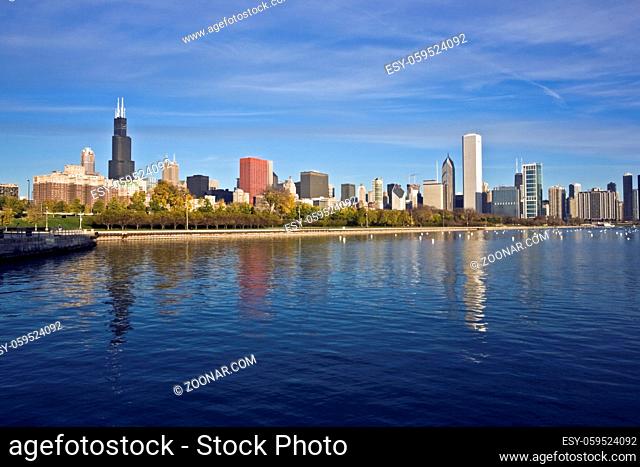 Downtown Chicago panorama reflected in Lake Michigan