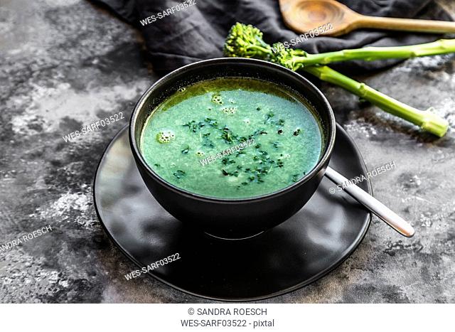Bowl of broccoli soup with cress