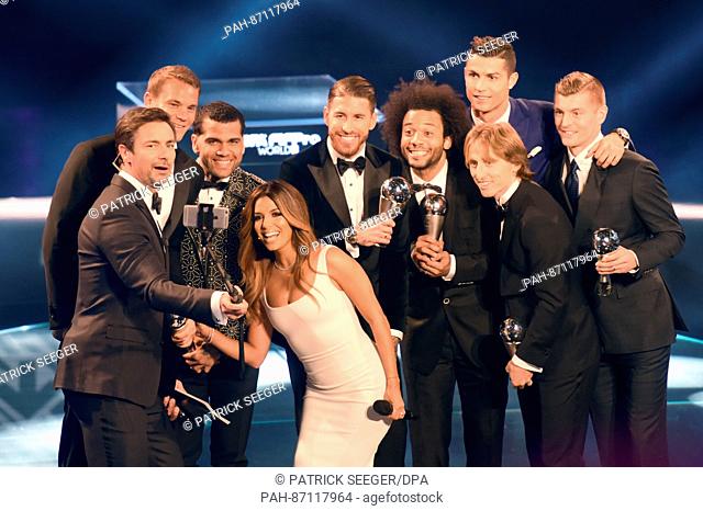 Presenter Marco Schreyl takes a selfie with players (l-r) Manuel Neuer (Germany, Bayern Munich), Daniel Alves (Brazil, Barcelona and Juventus)