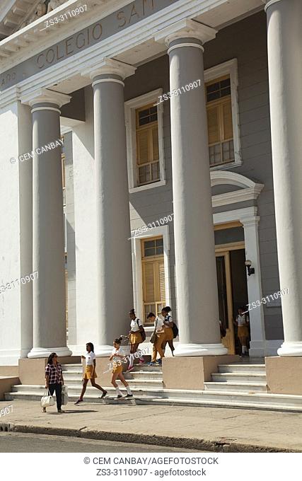 Students wearing uniforms at the entrance of the San Lorenzo college-Colegio San Lorenzo in Jose Marti Park at the historic center, Cienfuegos