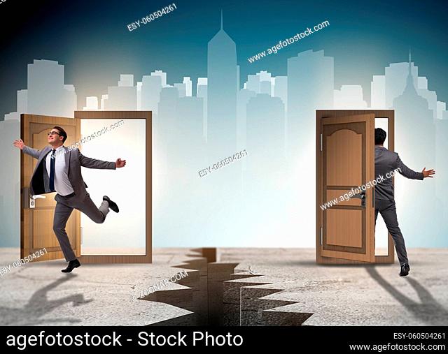 The businessman in teleportation concept with doors