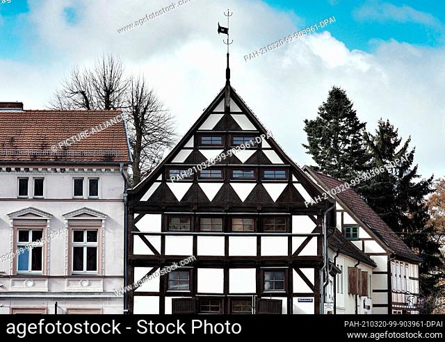 16 March 2021, Brandenburg, Perleberg: Renovated residential and commercial buildings stand on the shoe market. The district town in the Prignitz lies on the...