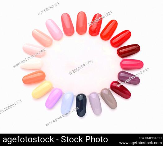 Top view of nails polish manicure samples palette isolated on white
