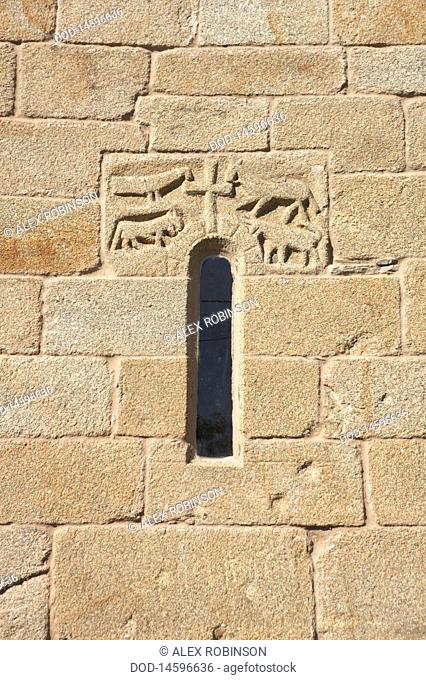 Spain, Galicia, Parada de Sil, Bas relief on exterior of church