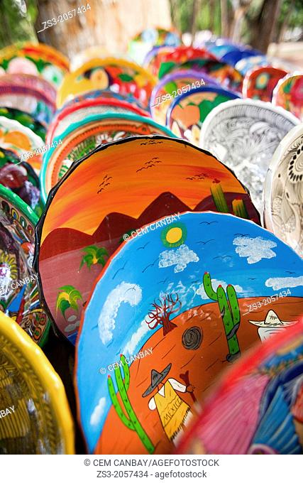 Colorful ceramic plates at an open market in Chichen Itza Ruins, Yucatan, Mexico