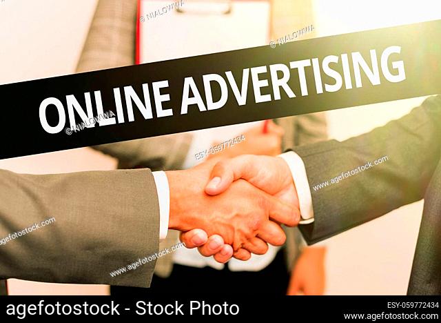Sign displaying Online Advertising, Business showcase uses the Internet to marketing messages to customers Two Professional Well-Dressed Corporate Businessmen...