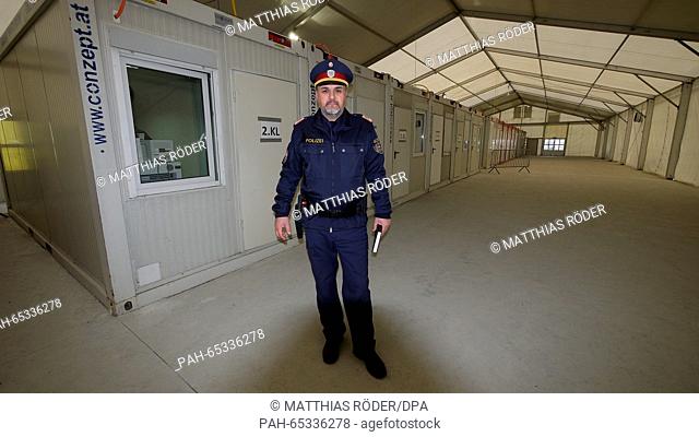 Inspector Fritz Grundnig of the Steiermark state police headquarters poses in a hall where numerous containers with work desks have been set up to check...