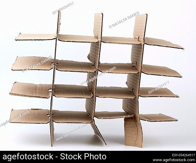 brown cardboard partition for a box, a subject for transporting bottles on a white background