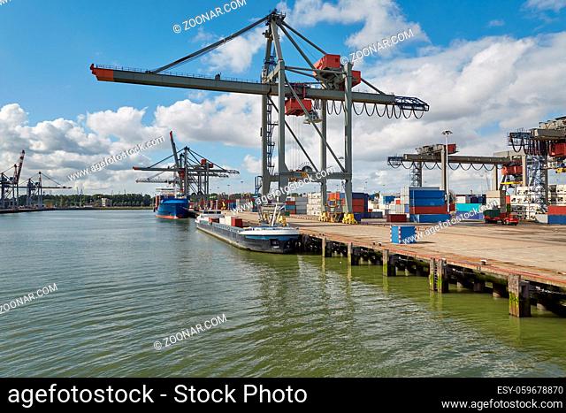 Container ship and cranes in a dock Waalhaven, Rotterdam
