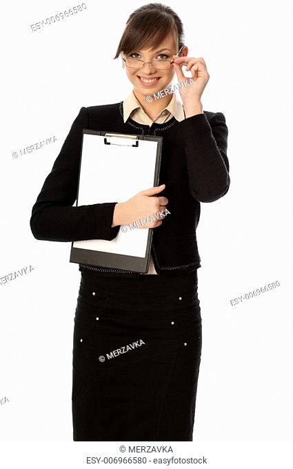 The new worker holds clipboard with the white blank paper in the hand